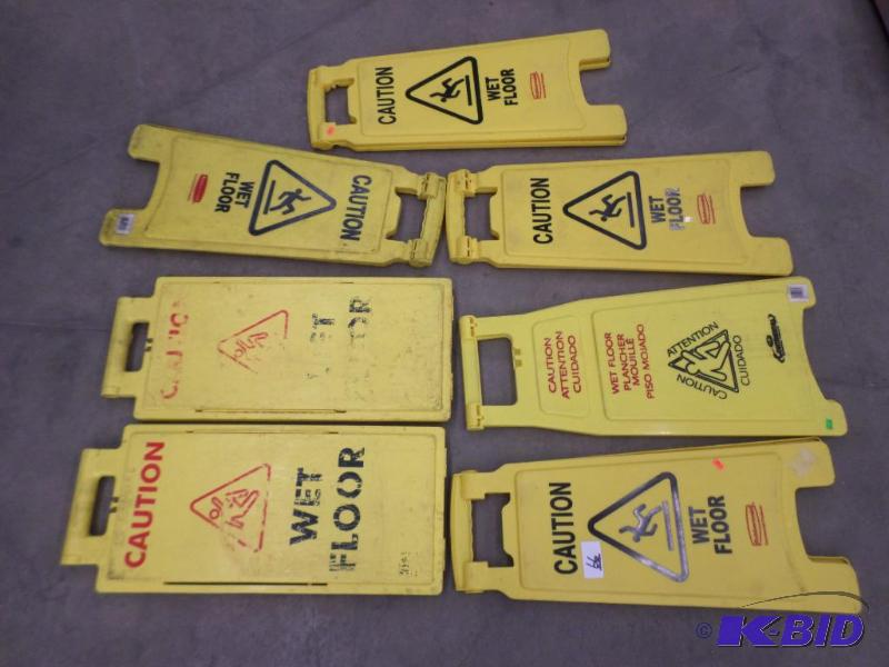 (7) Folding Wet Floor Signs...
