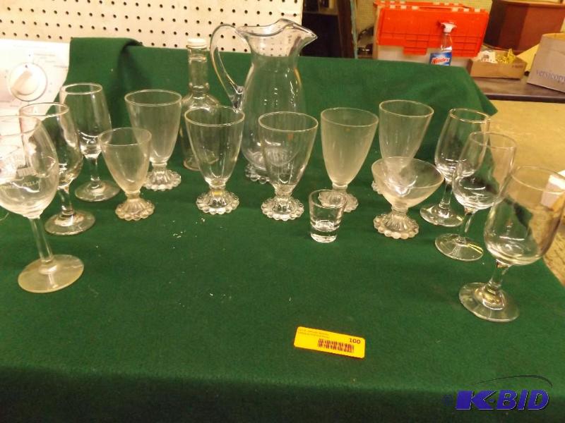 lot 100 image: wine and drink glasses, water pitcher...