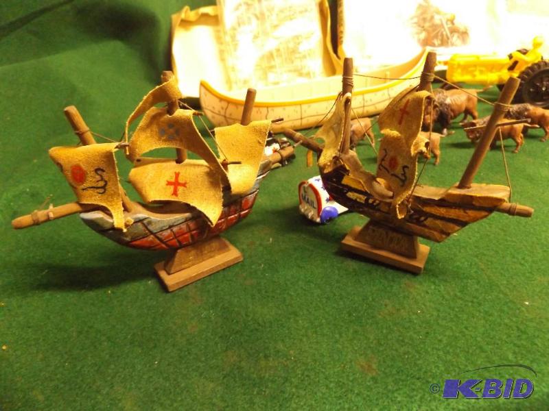 lot 12 image: two ships, canoe, plastic tractor, German Sid...