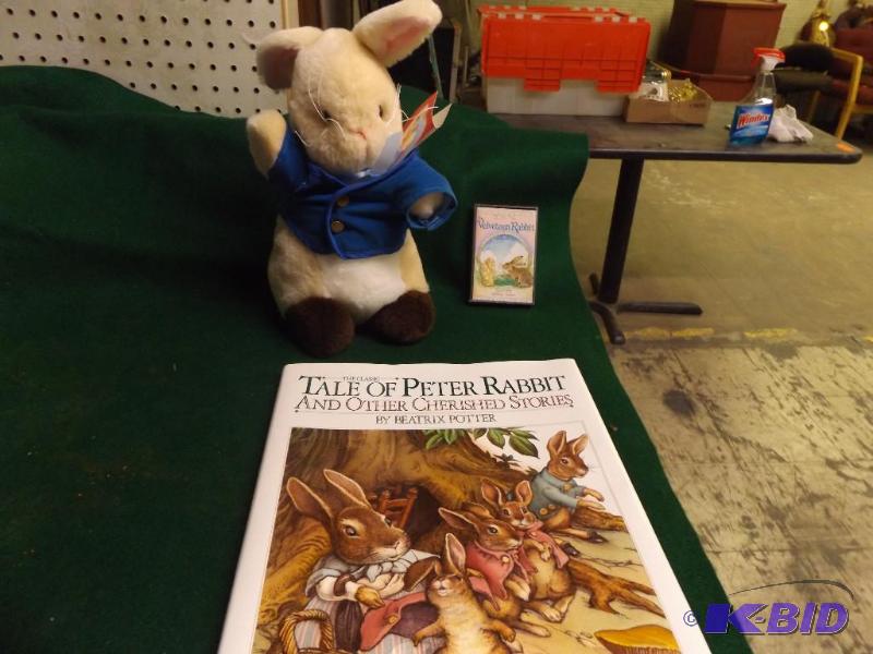 lot 15 image: Tale of Peter Rabbit book and stuffed rabbit,...
