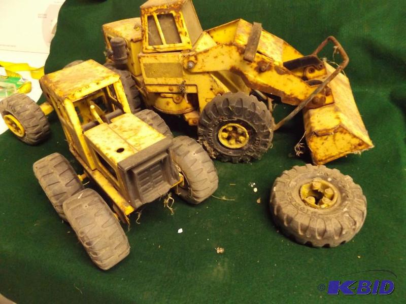 lot 175 image: two old Tonka trucks...