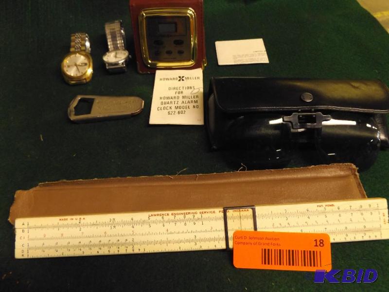 lot 18 image: two watches, travel alarm clock, engineering ...