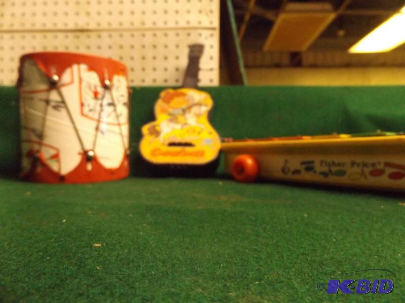 lot 36 image: Fisher Price Xylaphone, toy drum, toy guitar...