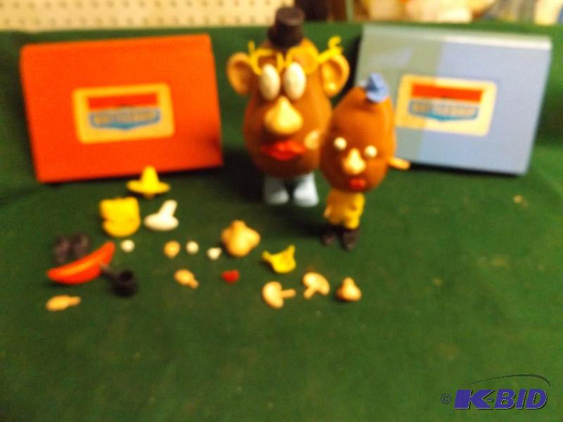 lot 37 image: two Mr Potato Heads and Battleship game...