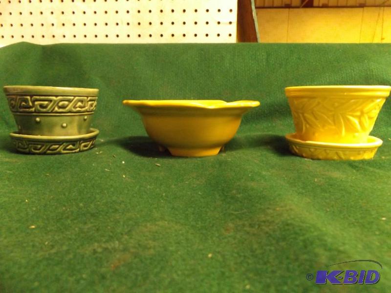 lot 46 image: three McCoy Flower Pots...