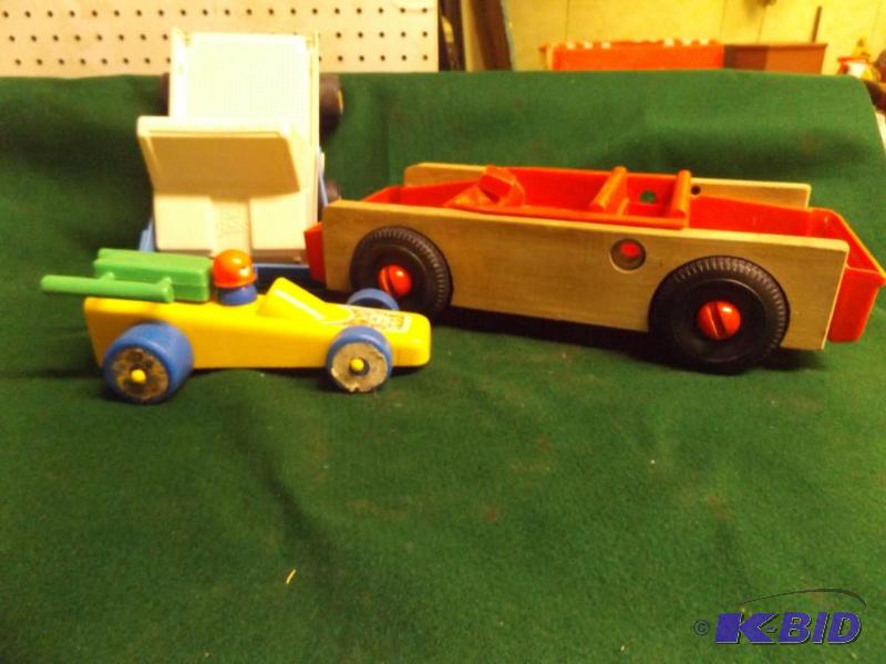 lot 5 image: toy race car, wooden car, and Big Boss Truck...