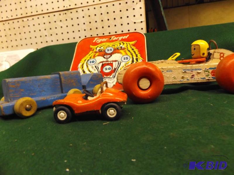 lot 86 image: older toys, wooden cars, Tiger Target, Bulls...