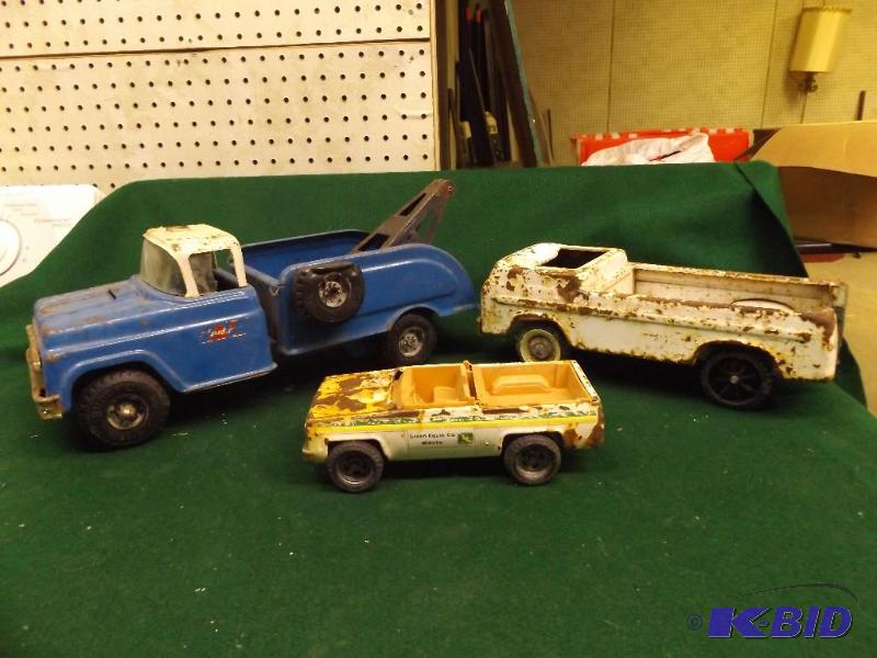 lot 87 image: Old metal trucks...