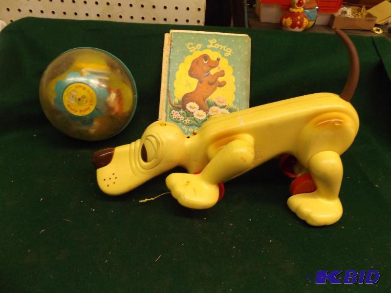 lot 91 image: Roly Poly Fisher Price toy, pull behind dog -...