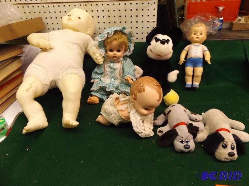 lot 94 image: older baby dolls and stuffed dogs...