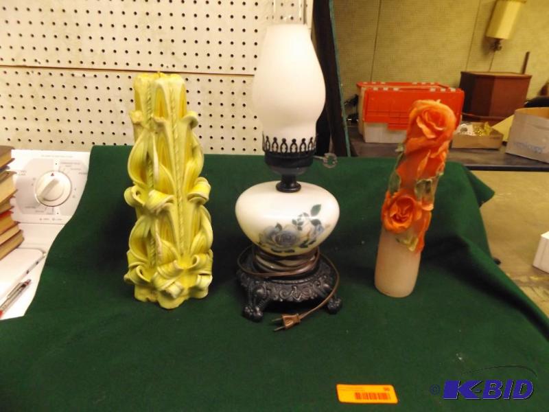 lot 96 image: two candles and electric lamp...
