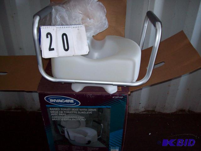 Invacare Raised Toilet Seat With Arms, New in...