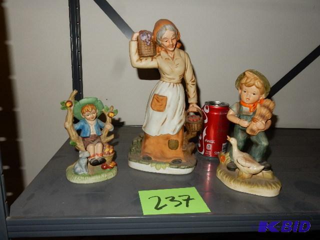 Woman and 2 Boys statues