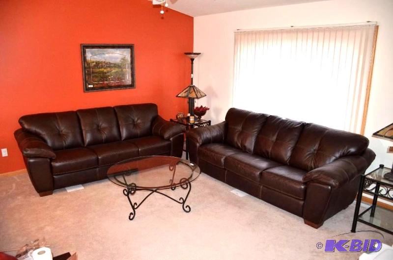 lot 1 image: Very nice leather couch, barely used or sat ...