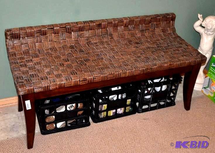 lot 102 image: Woven top hall bench . The black crates under...