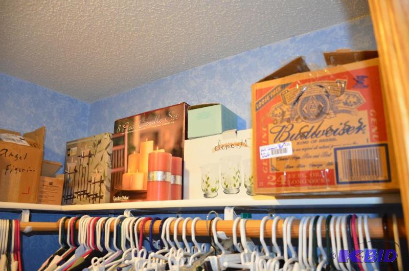 lot 125 image: All candles and glass ware on shelf, includes...
