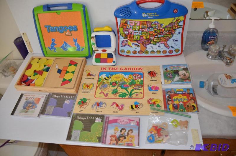 lot 156 image: Childrens puzzles, electronic games, childre...
