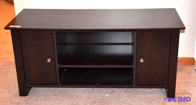 lot 18 image: Dark Wood TV table with storage. measures 16x...