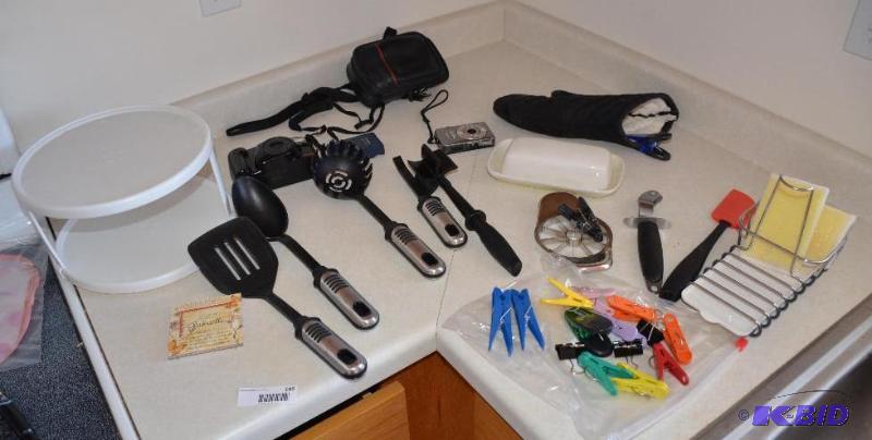 lot 185 image: Cameras, kitchen utensils, butter dish, clips...