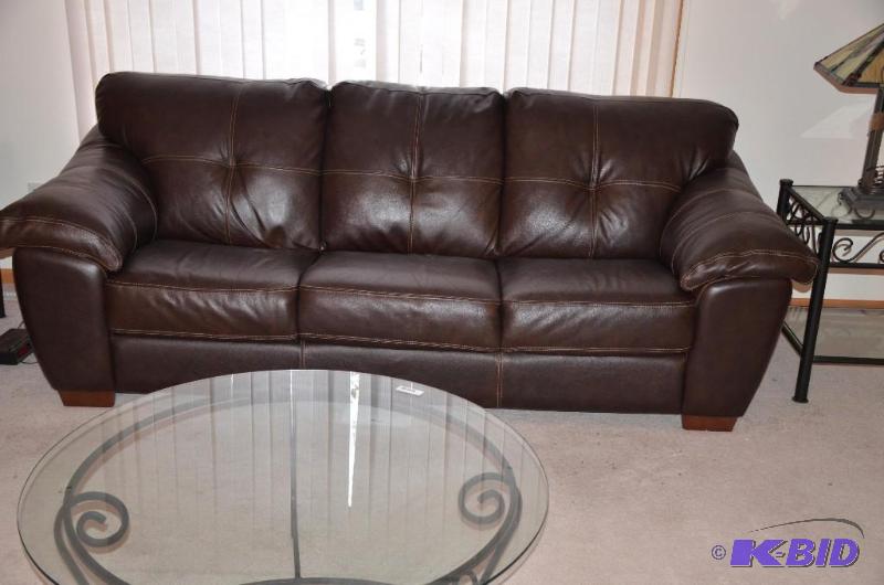 lot 2 image: Very nice leather couch, barely used or ...