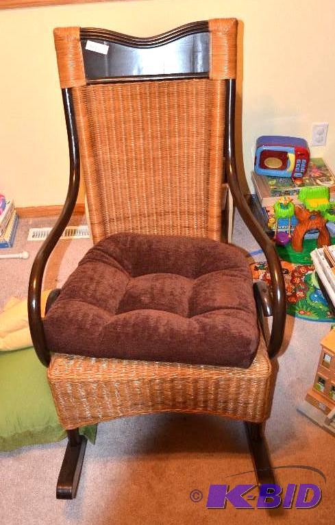 lot 41 image: Wicker rocker, padded seat with two pillows...