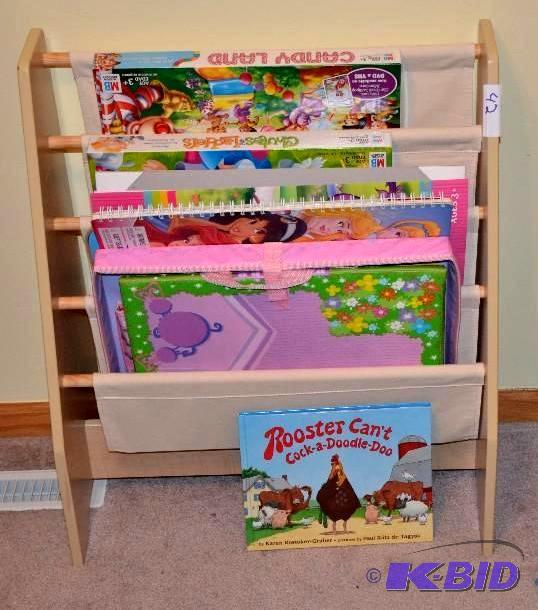 lot 42 image: Book and game rack or storage unit, 24x28&quo...