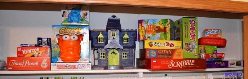 lot 51 image: All games and toys on shelf, including Phase ...