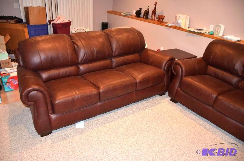 lot 57 image: Beautiful leather couch 80" long, matche...