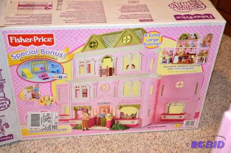 lot 68 image: Fisher Price Grand doll house, includes furni...