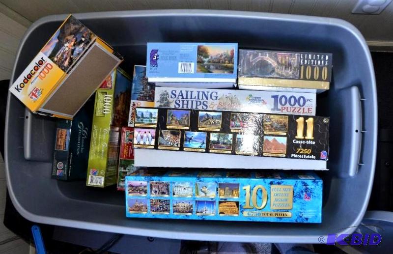 lot 74 image: Tub of large puzzles, some new...
