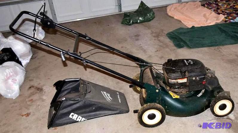 lot 92 image: Craftsman 21" front drive lawn mower #91...