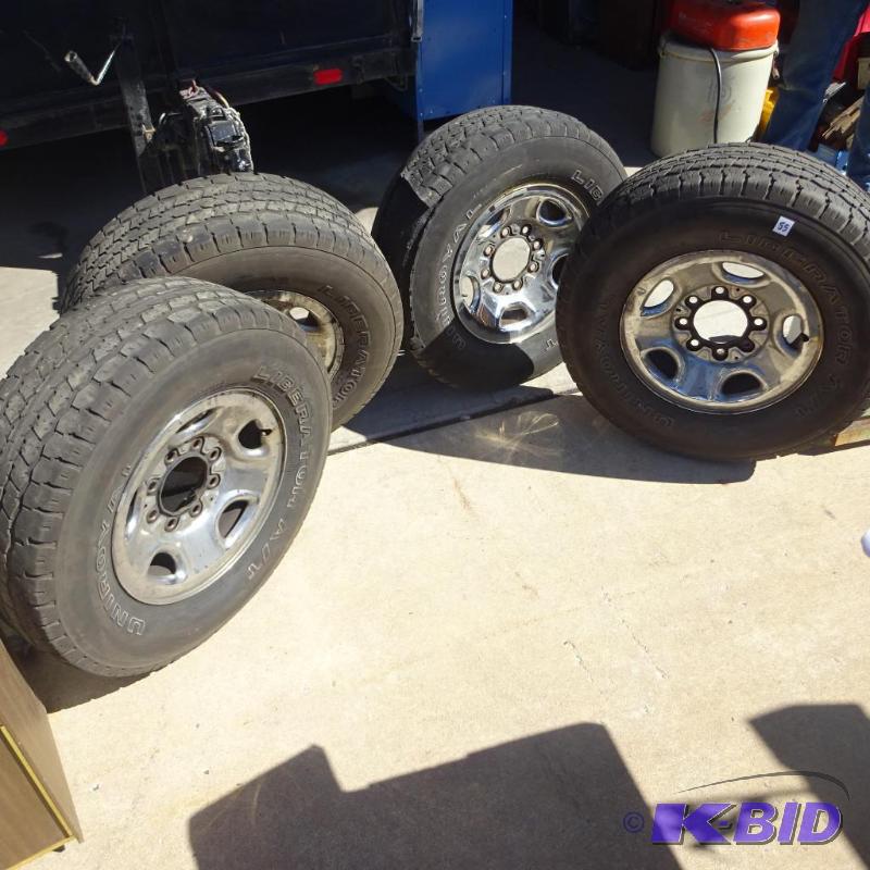 4 Truck Tires and Rims LT23575R16 Load Range...