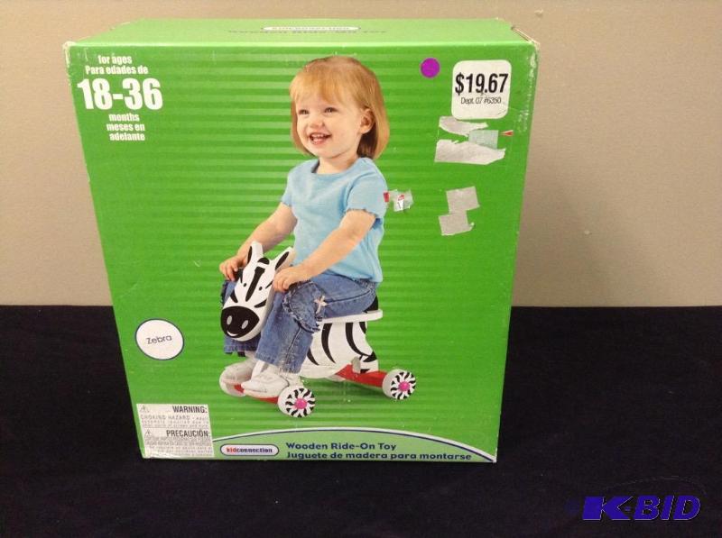 lot 10 image: Wooden Ride On Zebra Toy