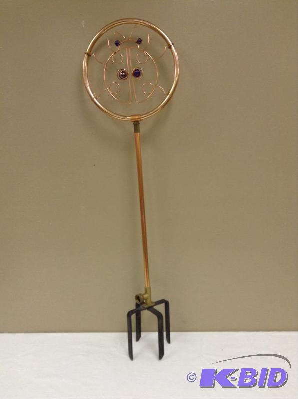 lot 12 image: Lady Bug Garden Watering Stand