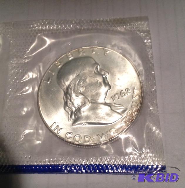lot 34 image: 1962-P Silver Franklin Half Dollar Still in Government Packaging Gem BU