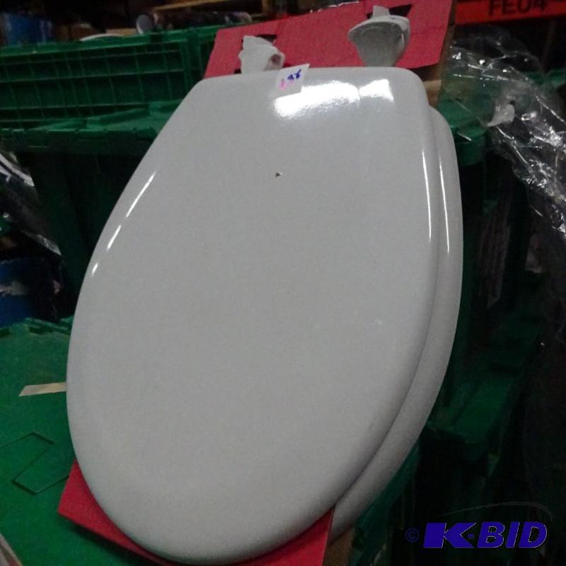 New white round front toilet seat...