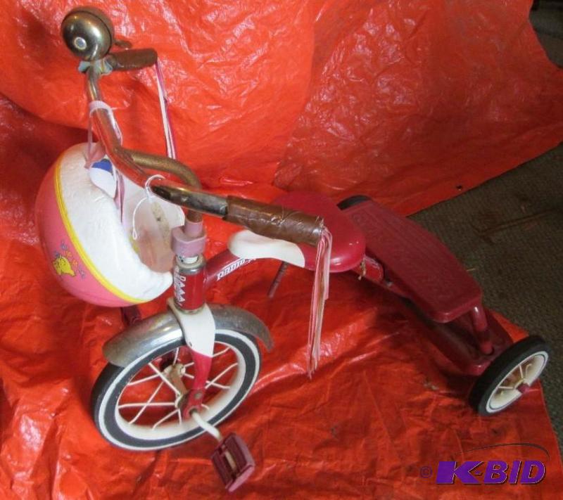 Radio Flyer metal tricycle with helmet...