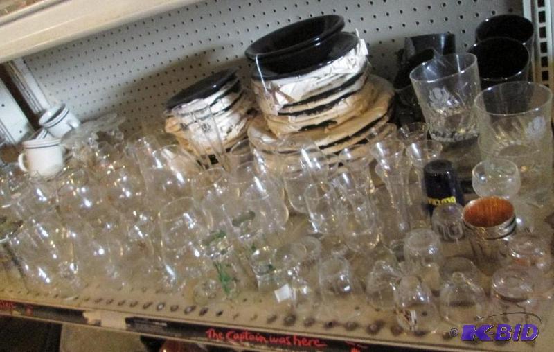 Large lot of drink glasses and a black dishn ...