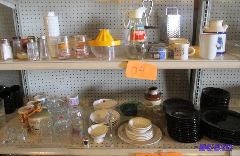 Lot of assorted kitchenware and a black plate...
