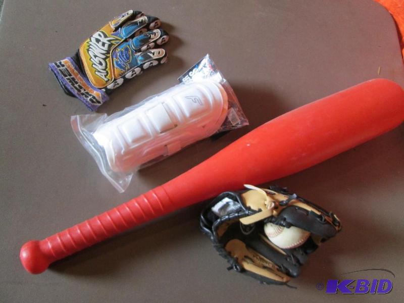 Lot of shin guards ball and glove and more sp...