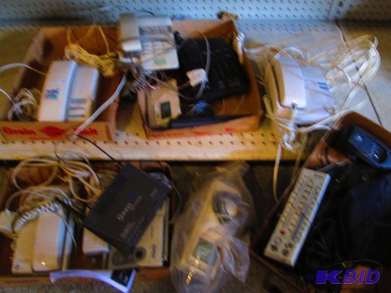 Lot of assorted telephones electronics and mo...