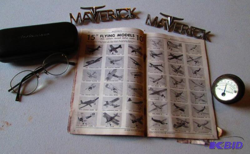 Vintage model plane book, Maverick logos, and...