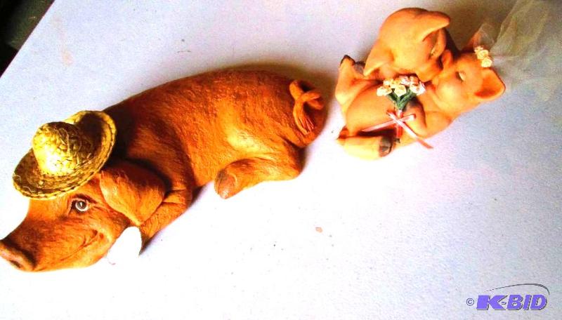 Pair of pig dcor, one is missing a leg...