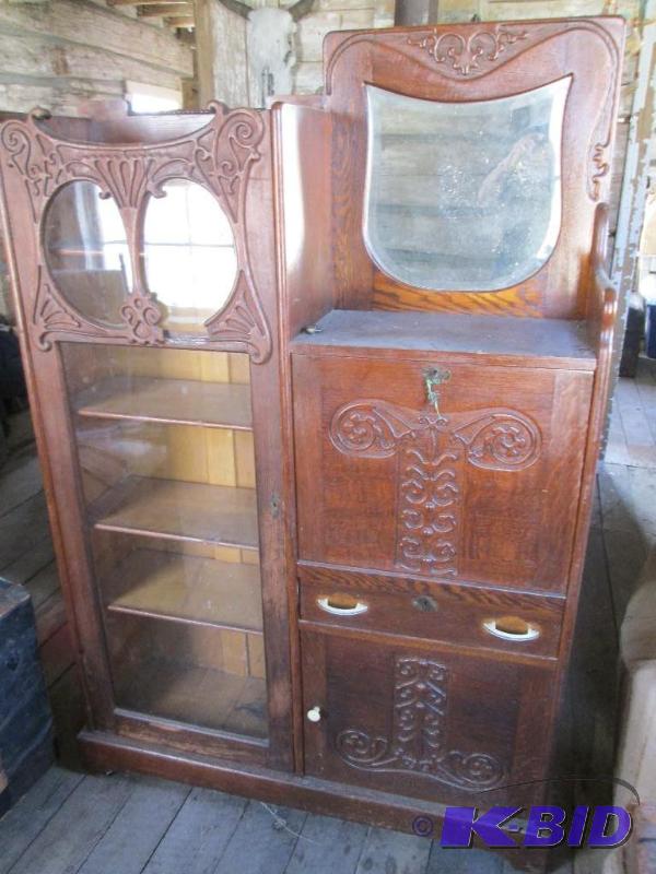 Very ornate antique secretary with glass door...
