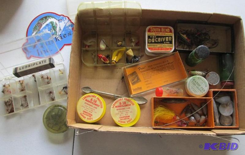 box of assorted vintage fishing lures, line, ...