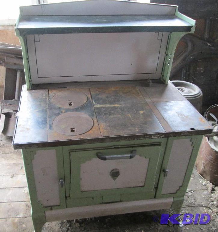 Antique cook stove, metal top, pale green col...