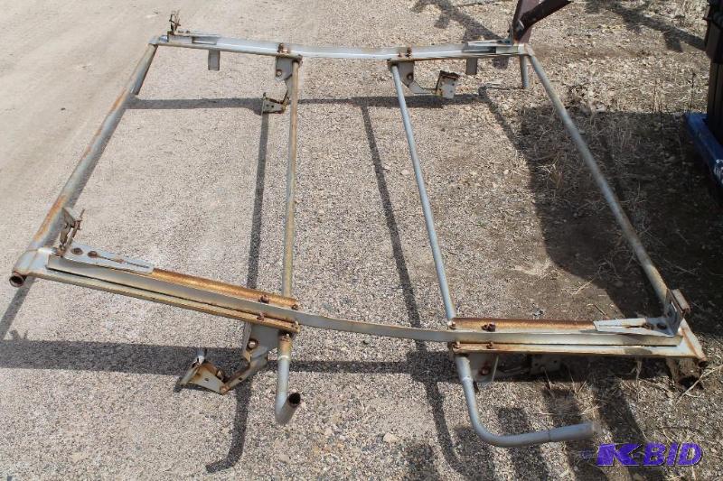 lot 18 image: Adjustable Ladder Rack ( Roof Mover )...