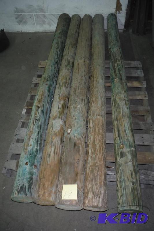 lot 19 image: Lot of 5 Green Treated Posts, 7 Foot by 5 to 5-12 Dia.