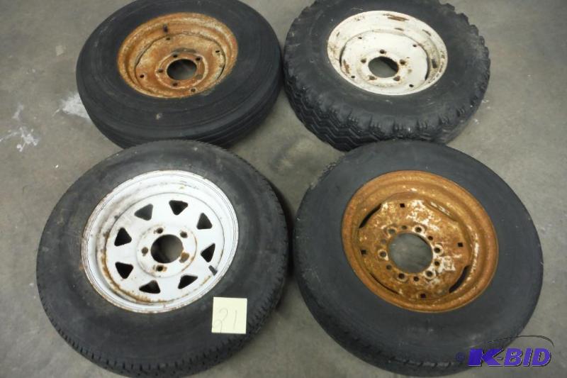 lot 21 image: Set of 4 Mismatched ires and rims 14 inch
