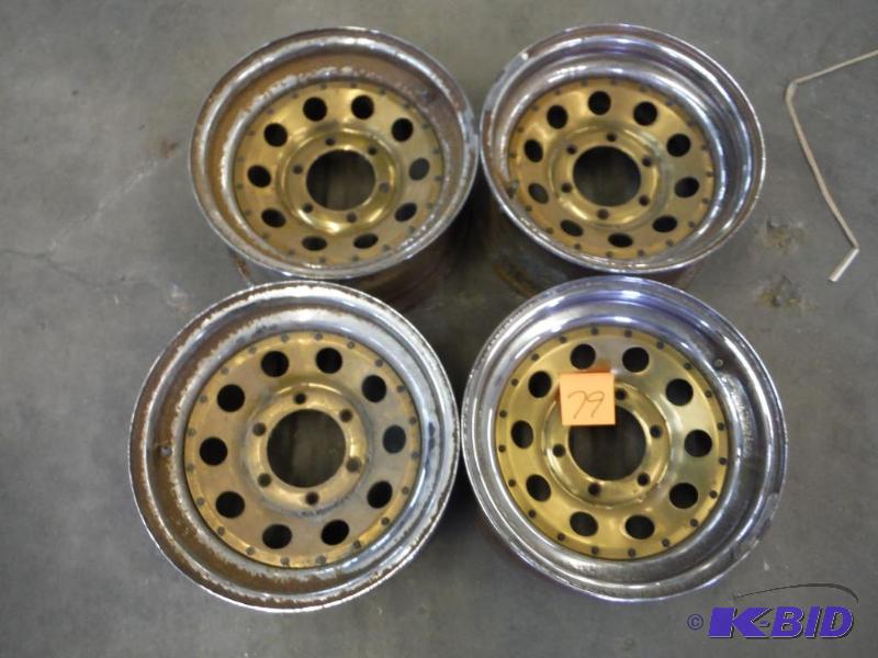 lot 79 image: 15x 7 Chevy 12 4x4 Rims Set of four